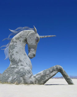 An arty photo of a kickass sculpture of a unicorn